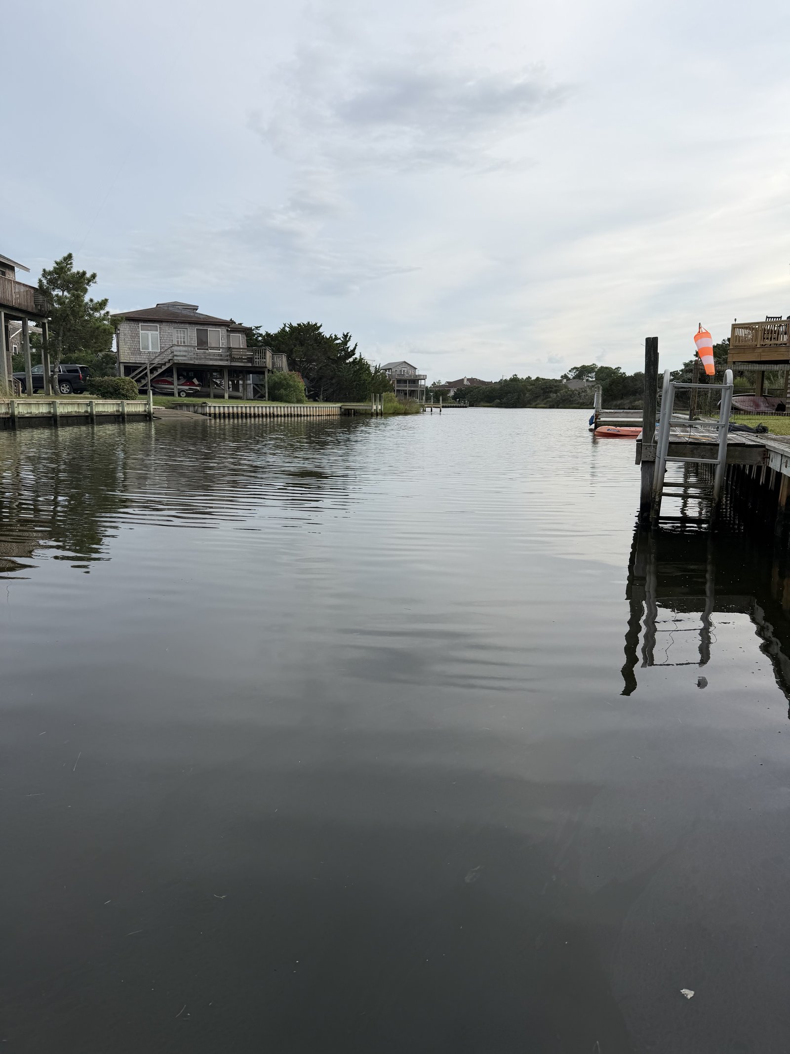 The quiet canal looking out toward the sound from the dock at Lucky Landing