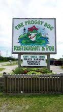 The Froggy Dog restaurant sign in Avon advertising soft-shell crab and karaoke